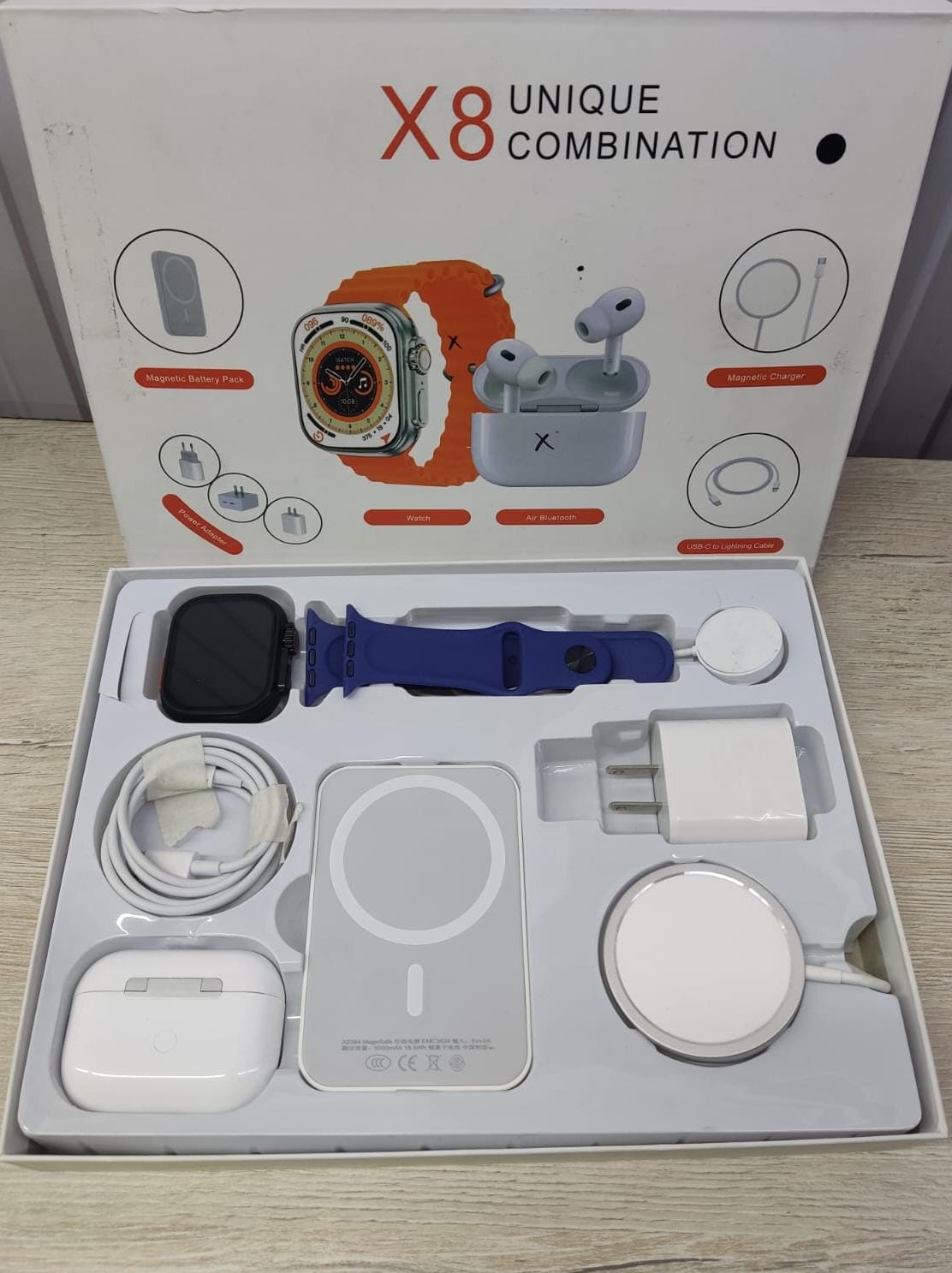 Reloj inteligente con audifonos y Powerbank